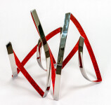 This contemporary indoor metal sculpture symbolizes fire. Image 15