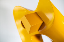 This abstract yellow table top steel sculpture by Viktor Mitic is named after stars. Image 7