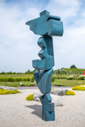 Tall and imposing, Titan is a contemporary sculpture created by Viktor Mitic, a Canadian sculptor known for his inspired work.