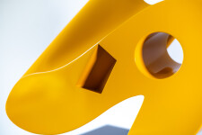 This abstract yellow table top steel sculpture by Viktor Mitic is named after stars. Image 6