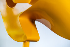 This abstract yellow table top steel sculpture by Viktor Mitic is named after stars. Image 8