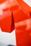 This abstract steel table top sculpture by Viktor Mitic has a red geometric form. Image 9