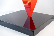 This abstract steel table top sculpture by Viktor Mitic has a red geometric form. Image 7