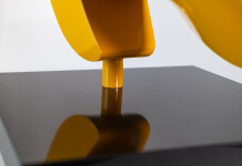 This abstract yellow table top steel sculpture by Viktor Mitic is named after stars. Image 5