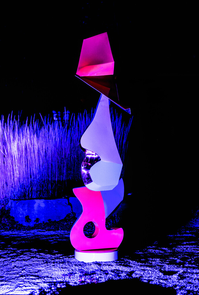 Gold plated stainless steel outdoor sculpture.