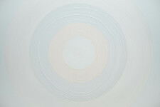 This dynamic contemporary circular painting in bright white is by Yvonne Lammerich. Image 4